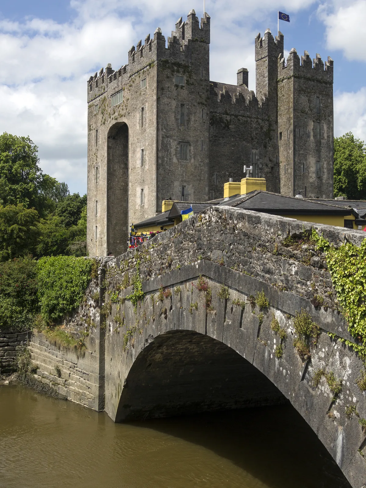 Bunratty Castle and its stone bridge, County Clare, Ireland